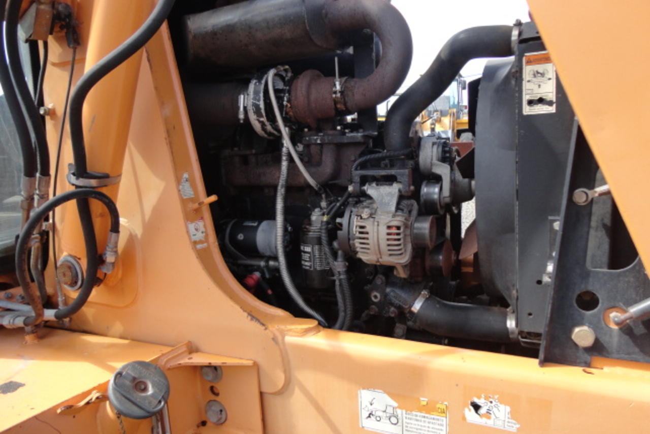 Case 580M - 08/08 6