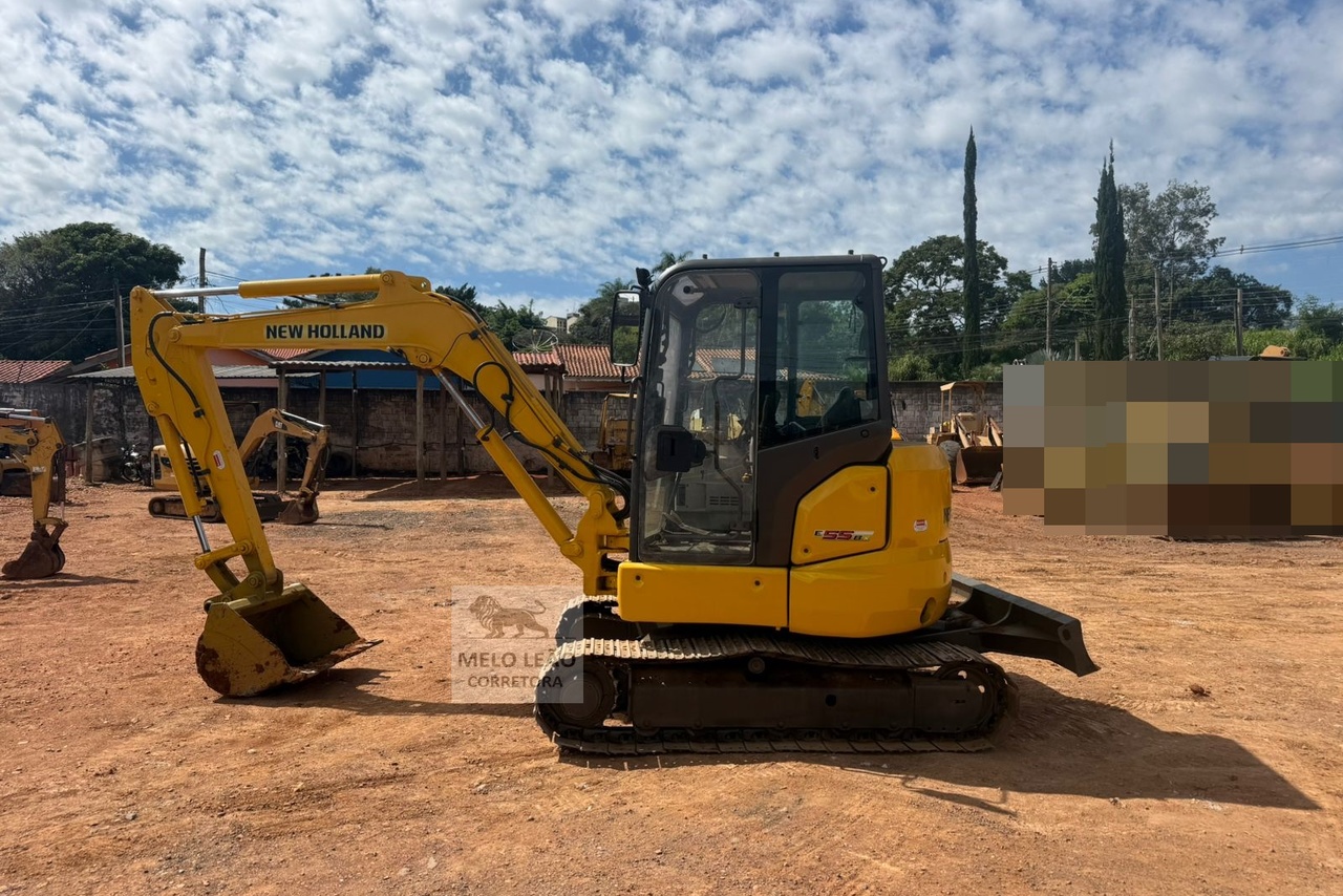 New Holland E55B - 16/16 11
