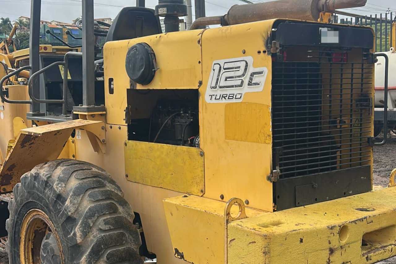 New Holland 12C - 10/10 2