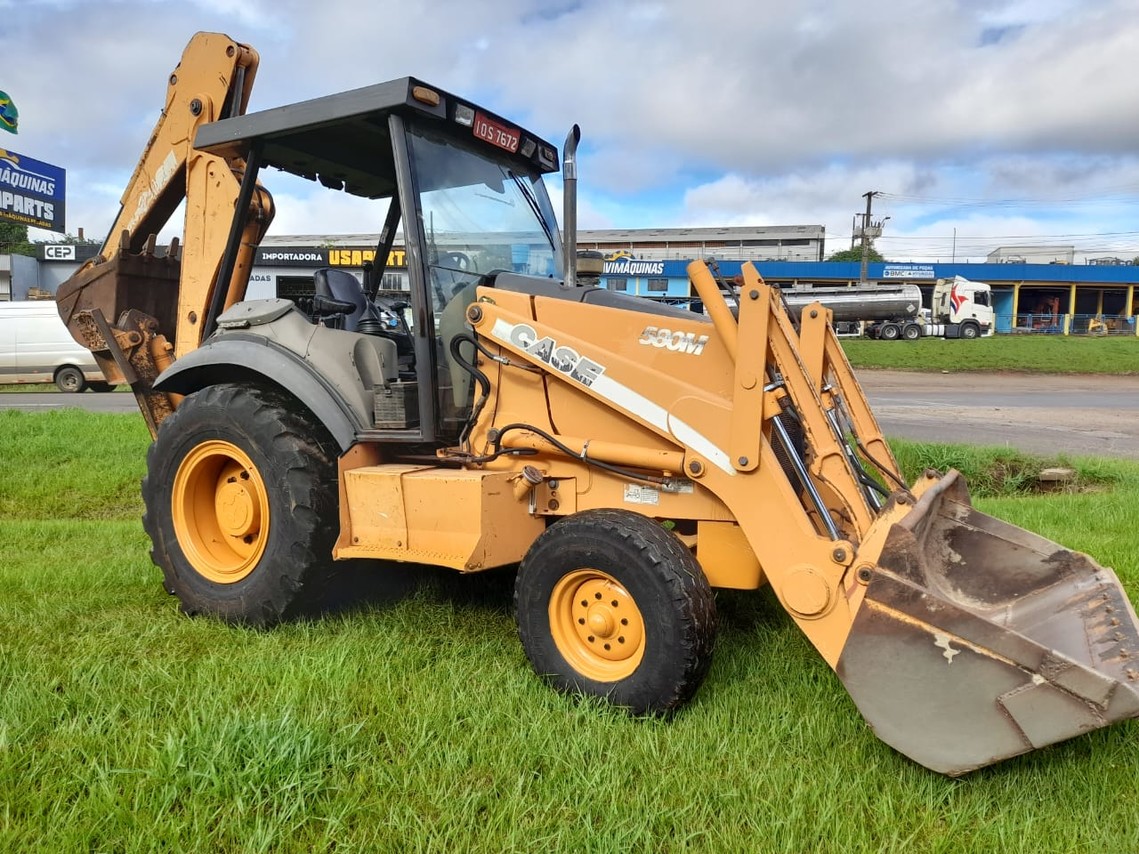 Case 580M - 08/08 6